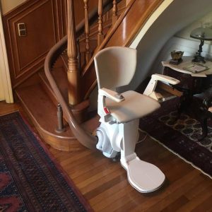 brown rail and silver chair